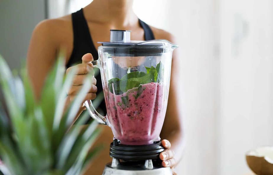 Woman making a smoothie
