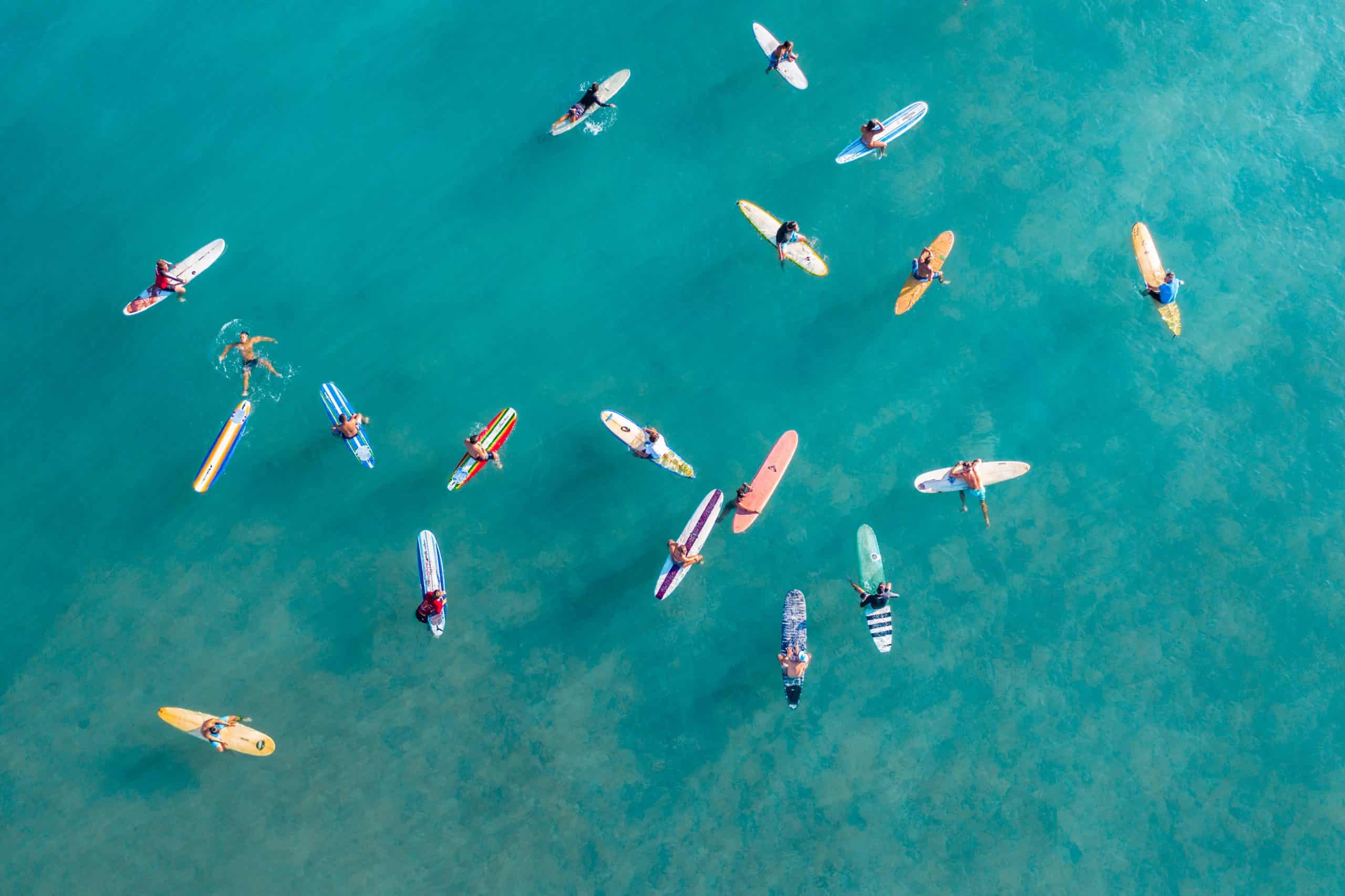 Waikiki offers sandy beaches, surf schools, and surfing competitions