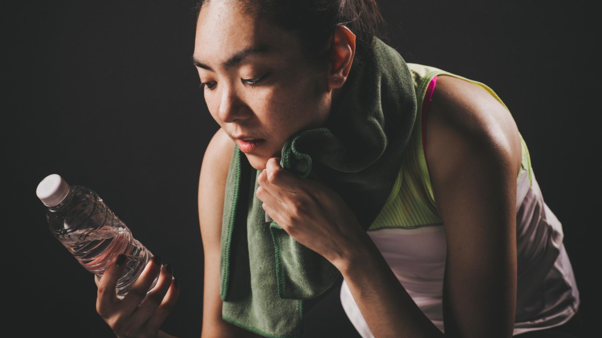 woman with electrolyte drink