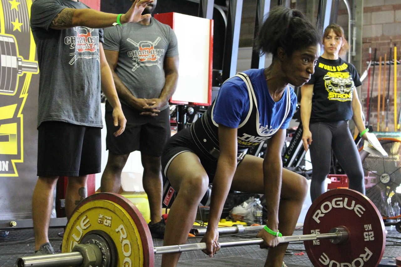 A woman powerlifting