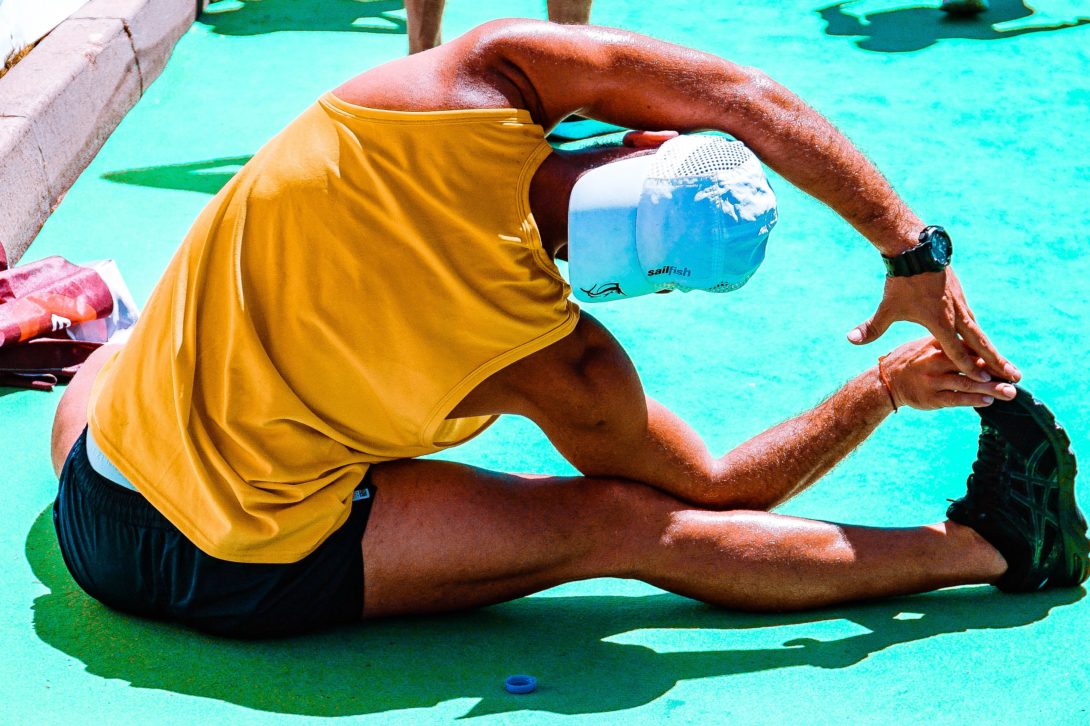 A man stretching outside