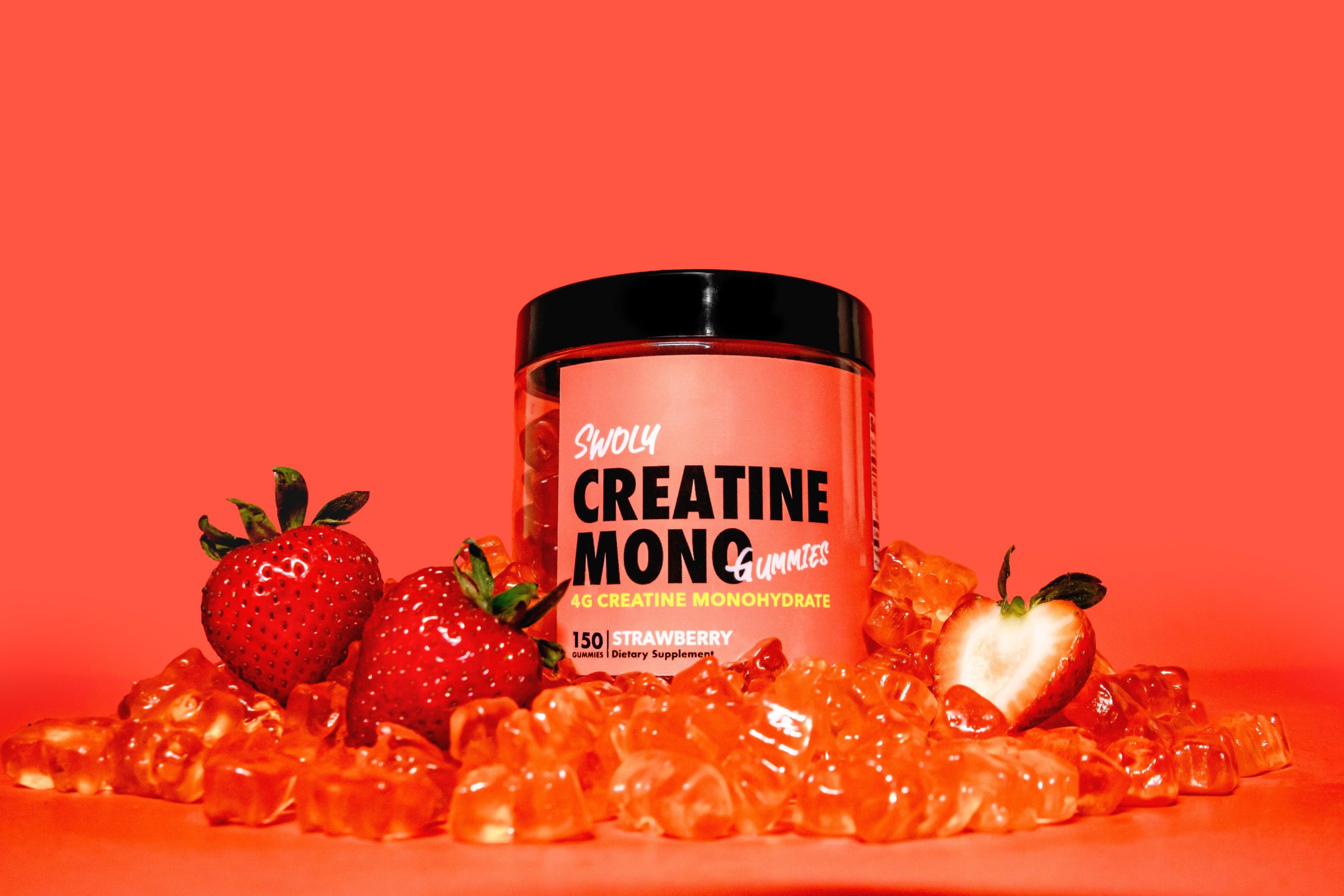 A bottle of strawberry-flavored creatine mono gummies