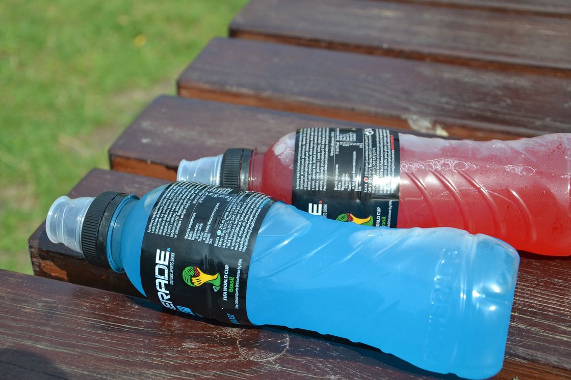 Two different flavors of Powerade drink placed on the table
